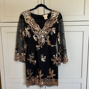 Altar’s State Black with rose gold sequined dress